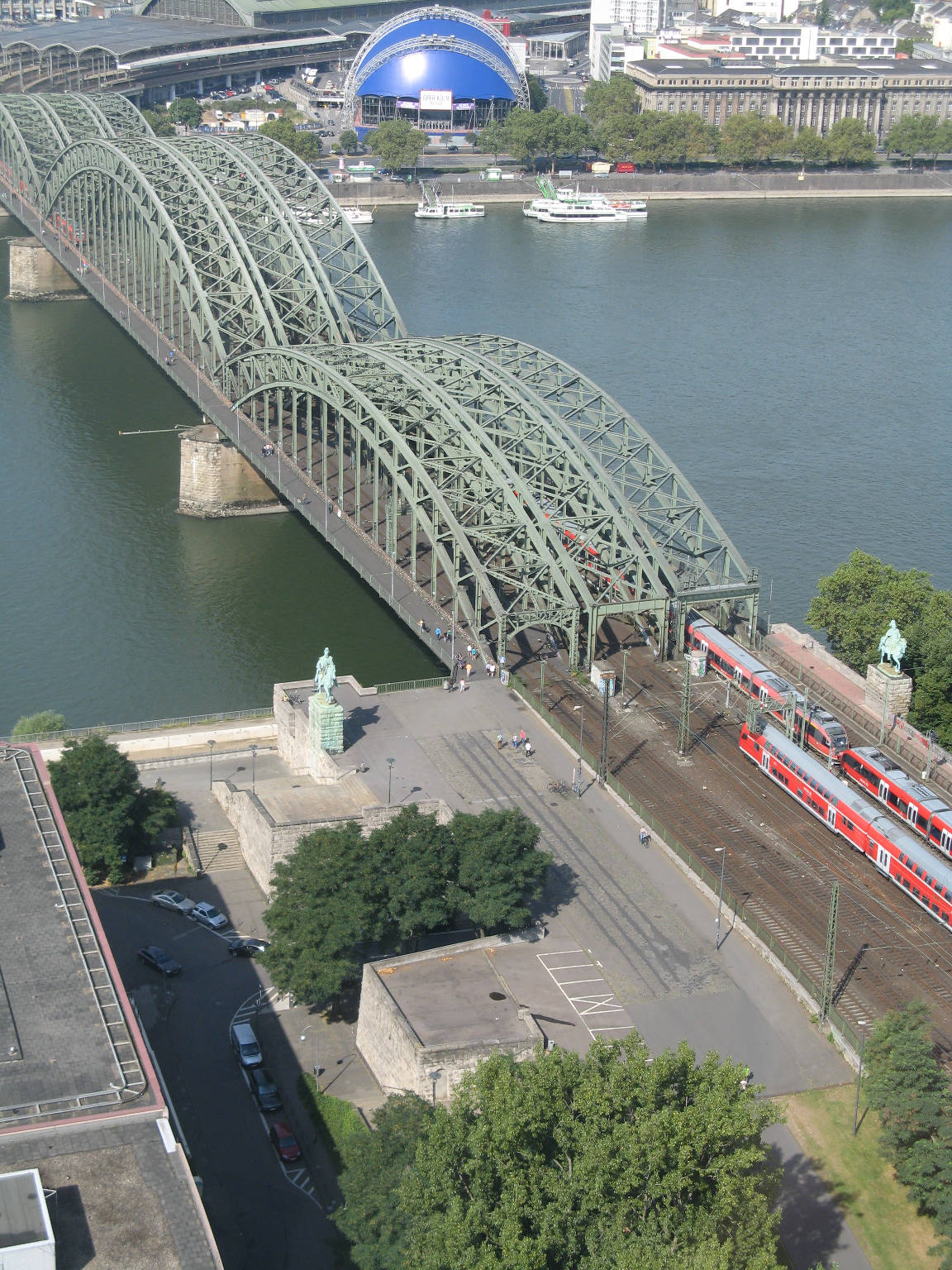 Two trains pass on the Hohenzollern Bridge